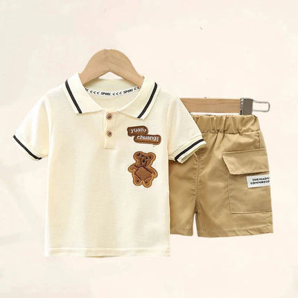 Jongens Zomerset | Blauw Polo T-shirt en Broek | Katoen | Ademend en Comfortabel | Cartoonprint | Geschikt voor Speelplezier en Dagelijkse Uitstapjes | Eenvoudige Verzorging en Aan- en Uittrekken