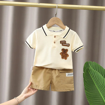 Jongens Zomerset | Blauw Polo T-shirt en Broek | Katoen | Ademend en Comfortabel | Cartoonprint | Geschikt voor Speelplezier en Dagelijkse Uitstapjes | Eenvoudige Verzorging en Aan- en Uittrekken