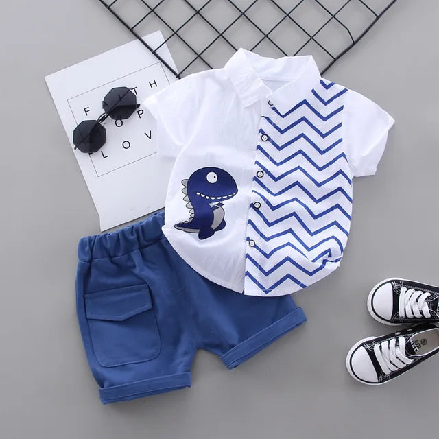 Babykleding Set | Kinderen Kleding | Blauw Dino Shirt & Broek | Grafische Prints | Zomerset | Comfortabele Pasvorm | Ademend & Zacht | Makkelijk Wasbaar | Ideaal voor Spel & Familie Uitjes